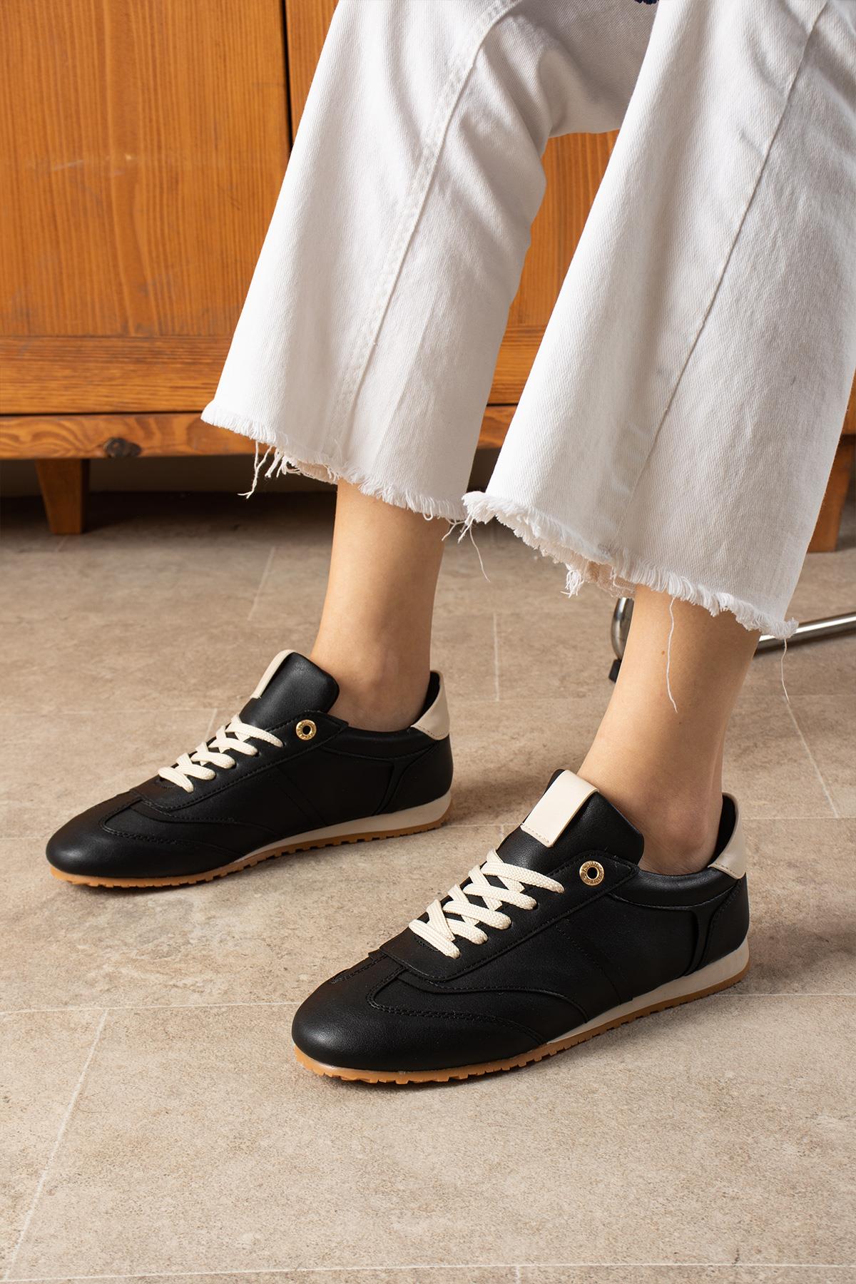 Despina Shoes Rose Siyah-Bej Suni Deri Kadın Sneaker – model üzerinde görünüm 4