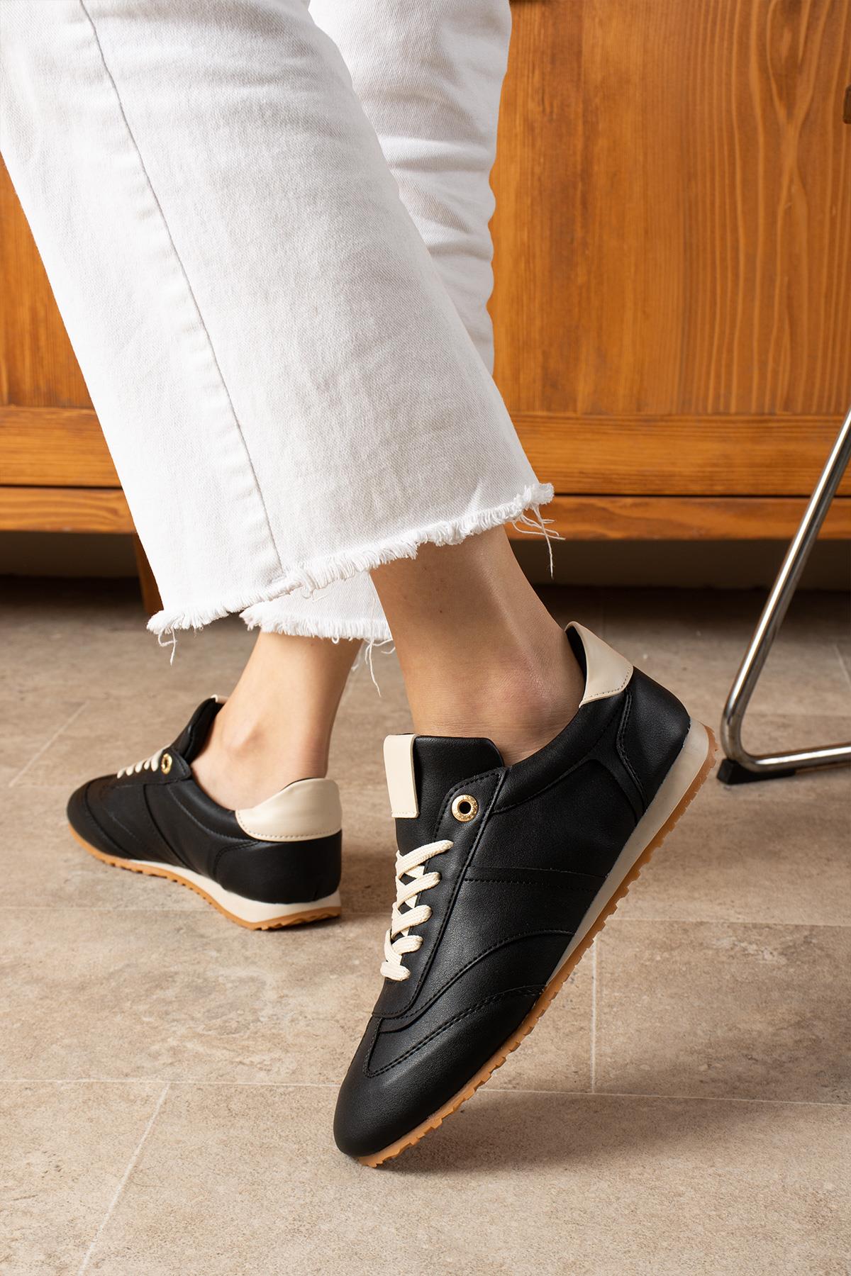 Despina Shoes Rose Siyah-Bej Suni Deri Kadın Sneaker – model üzerinde görünüm 2