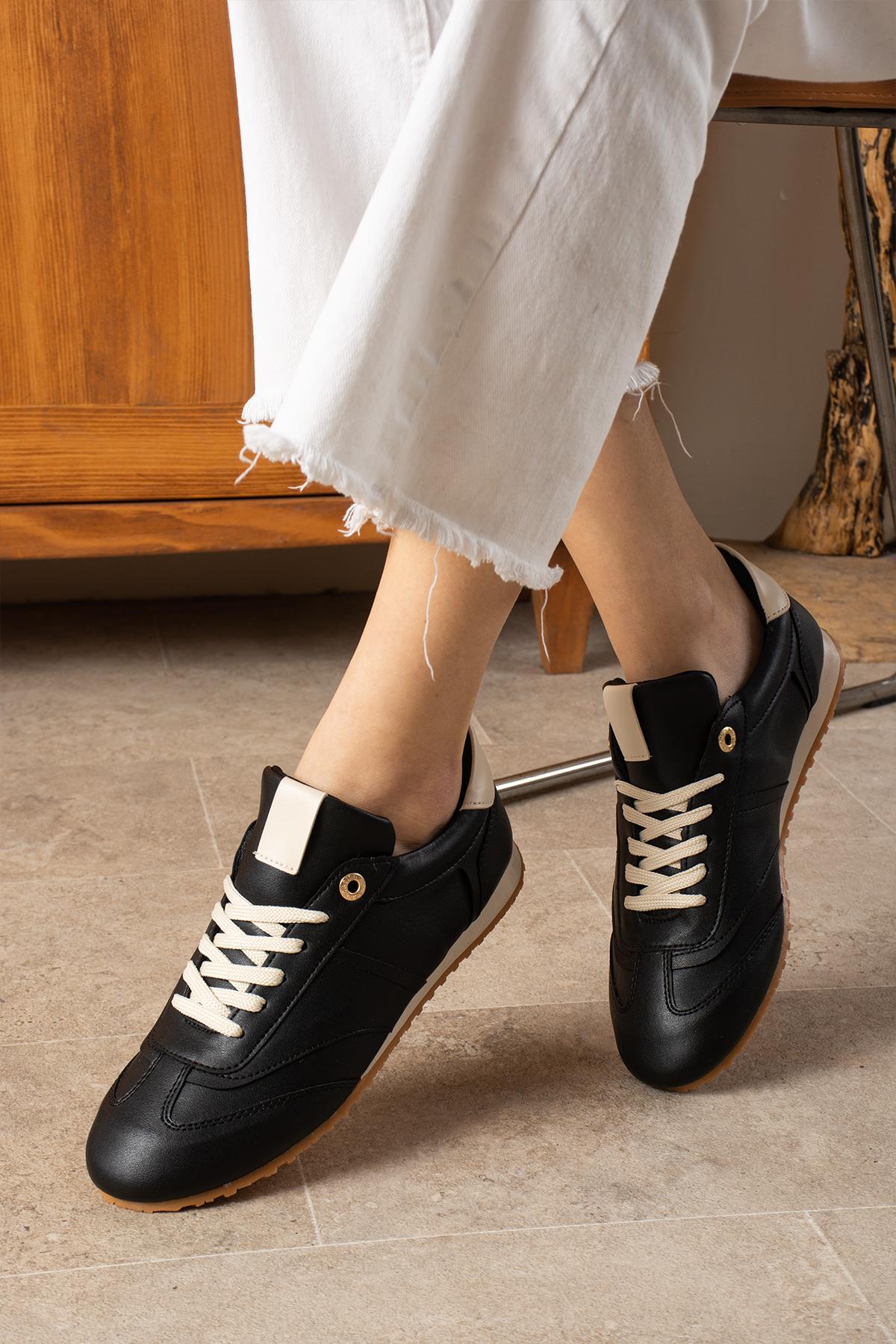 Despina Shoes Rose Siyah-Bej Suni Deri Kadın Sneaker – model üzerinde görünüm 3